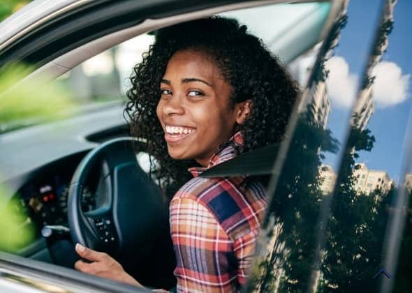 Person driving a car